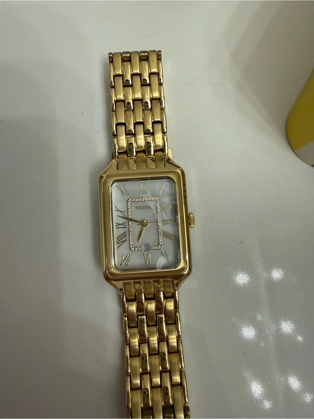 Fossil gold tone